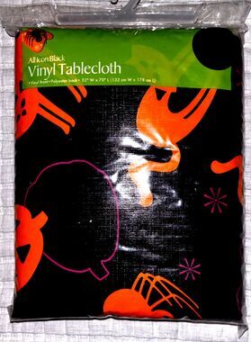Halloween Trick or Treat Vinyl Tablecloth 52" x 70" with 100% Polyester backing.